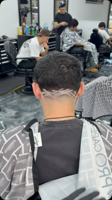 Fade with a design, shop floor in the background